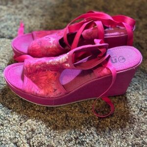 Pink platform sandals.